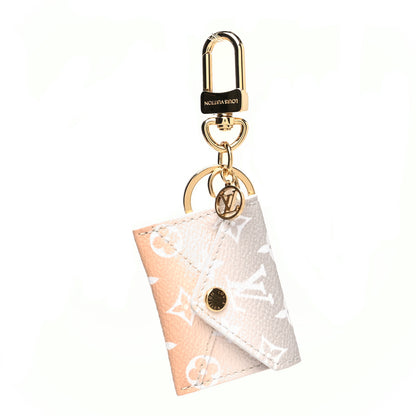 Louis Vuitton Monogram By The Pool Kirigami Pouch Key Holder Bag Charm Mist 1 of 5