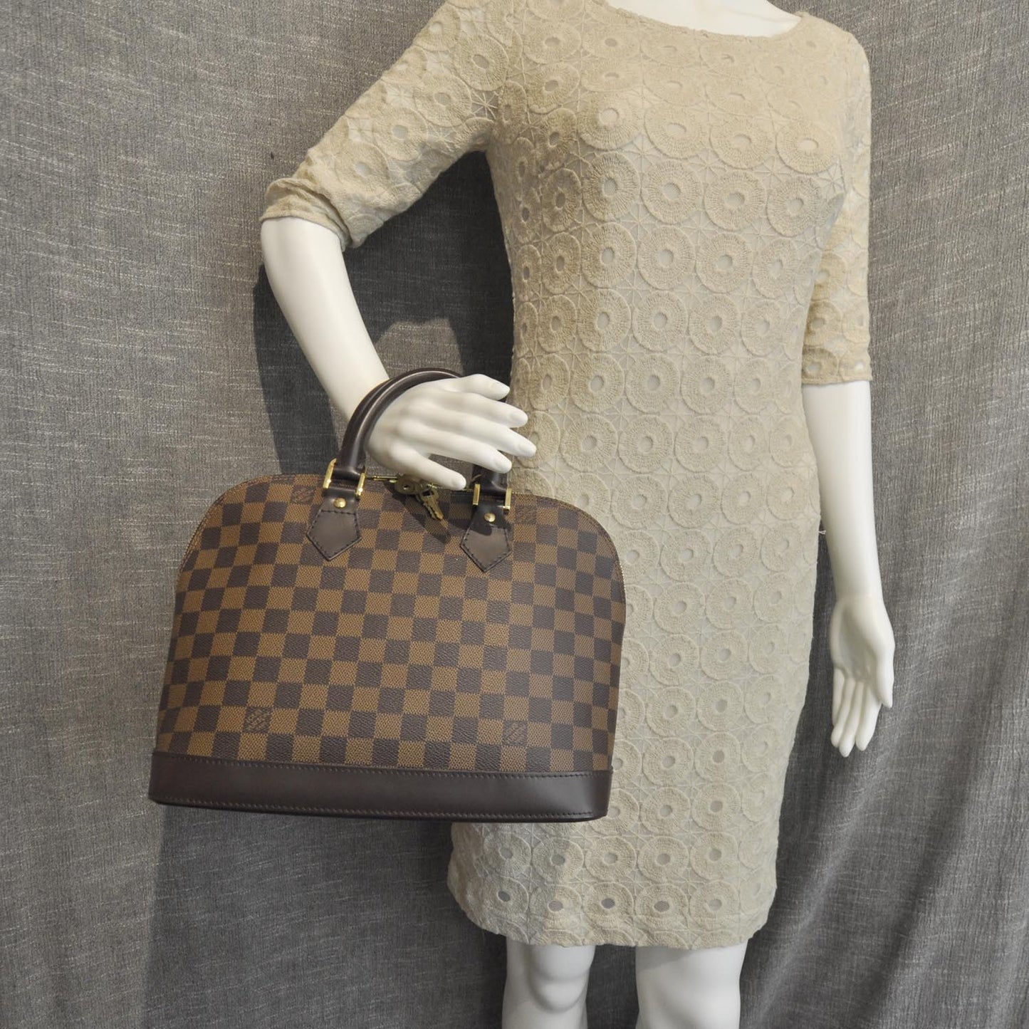 Damier Ebene Alma PM