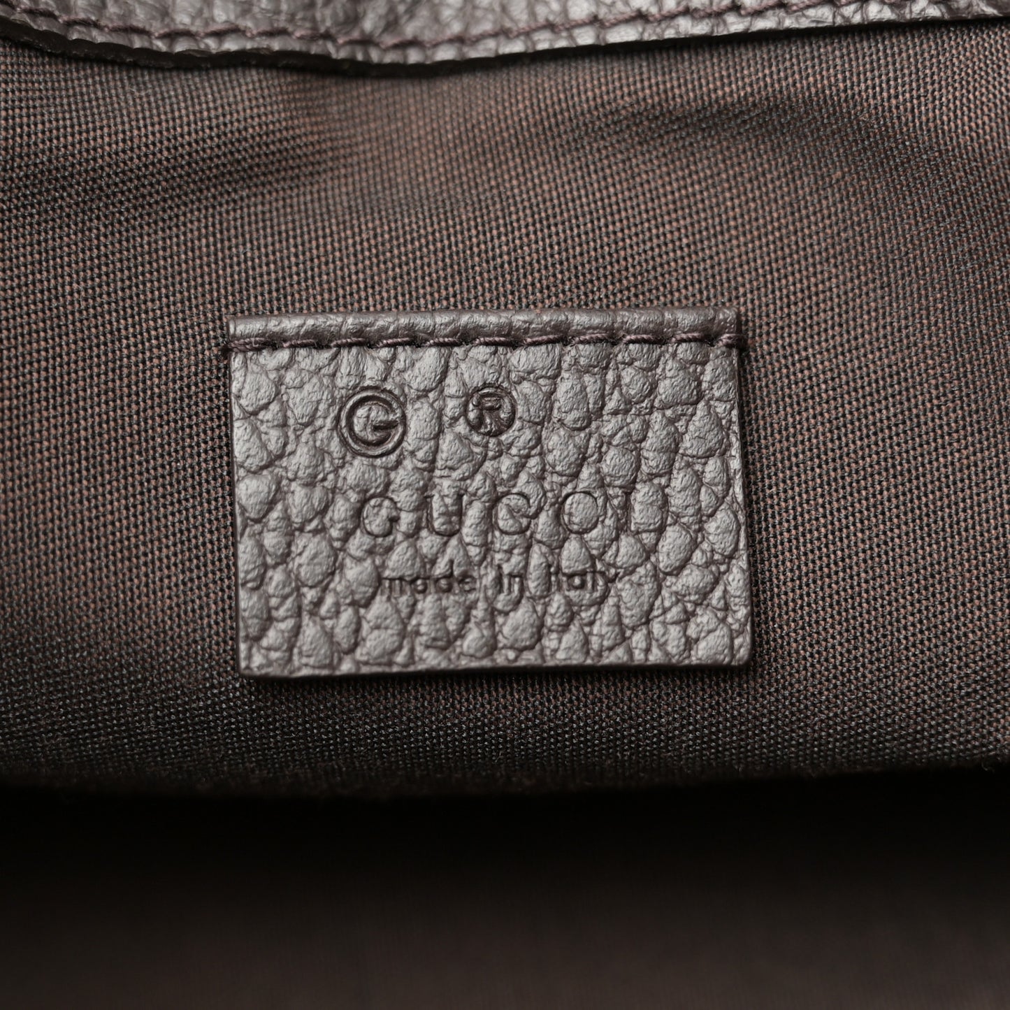 Monogram Dollar Calfskin O Drawstring Backpack Beige Ebony Testa di Moro Dark Chocolate