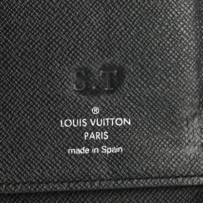 Louis Vuitton Taiga Vertical Zippy Wallet Black 7 of 9