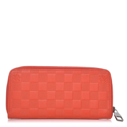 Louis Vuitton Damier Infini Zippy Vertical Wallet Magma 1 of 6