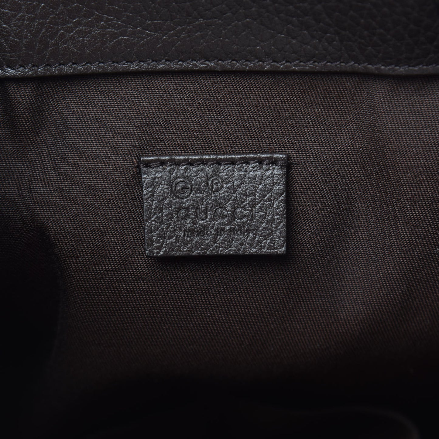 Monogram Dollar Calfskin O Drawstring Backpack Beige Ebony Testa di Moro Dark Chocolate