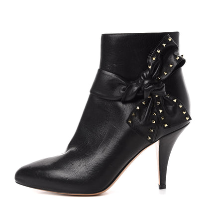 Valentino Garavani Calfskin Rockstud Bow Embellished Ankle Booties 37.5 Black 1 of 10