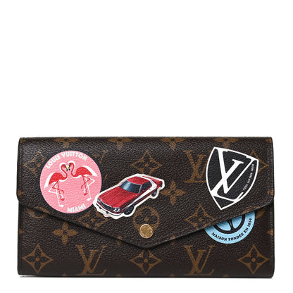 Louis Vuitton Monogram World Tour Sarah Wallet 1 of 9