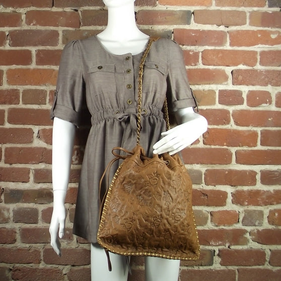 Chanel Leather Camellia Embossed Drawstring Shoulder Bag 2 of 8