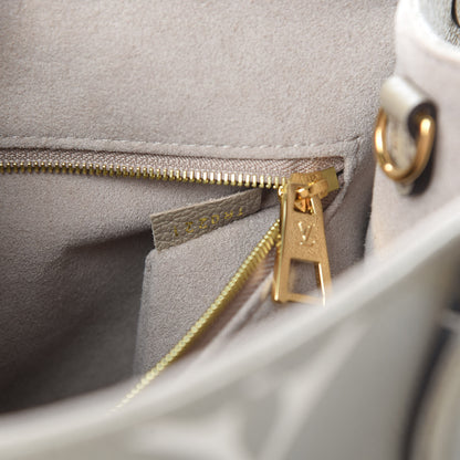 Louis Vuitton Empreinte Monogram Giant Onthego PM Tourterelle Creme 7 of 11