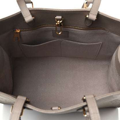 Louis Vuitton Empreinte Monogram Giant Onthego MM Tourterelle 7 of 8