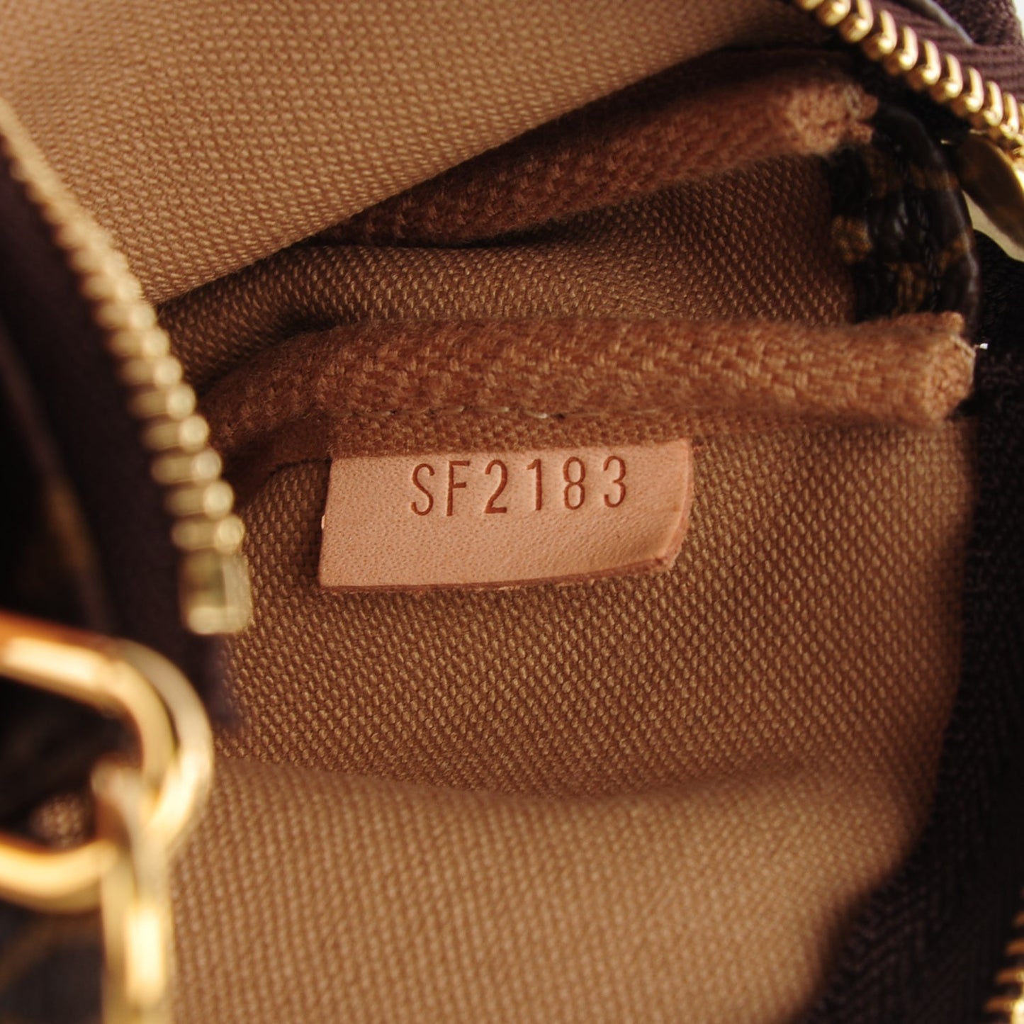 Monogram Trunks and Locks Mini Pochette Accessories