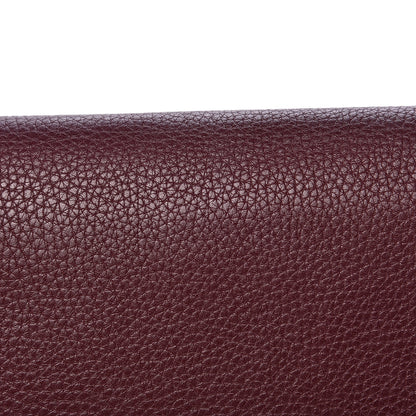 Valentino Garavani Pebbled Calfskin Rockstud Rolling Wristlet Clutch Rubin 11 of 11