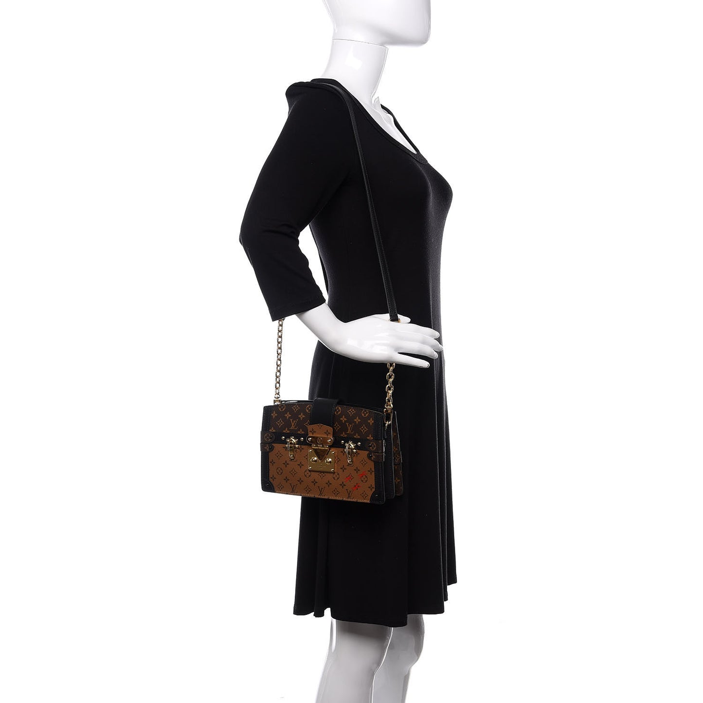 Reverse Monogram Trunk Clutch