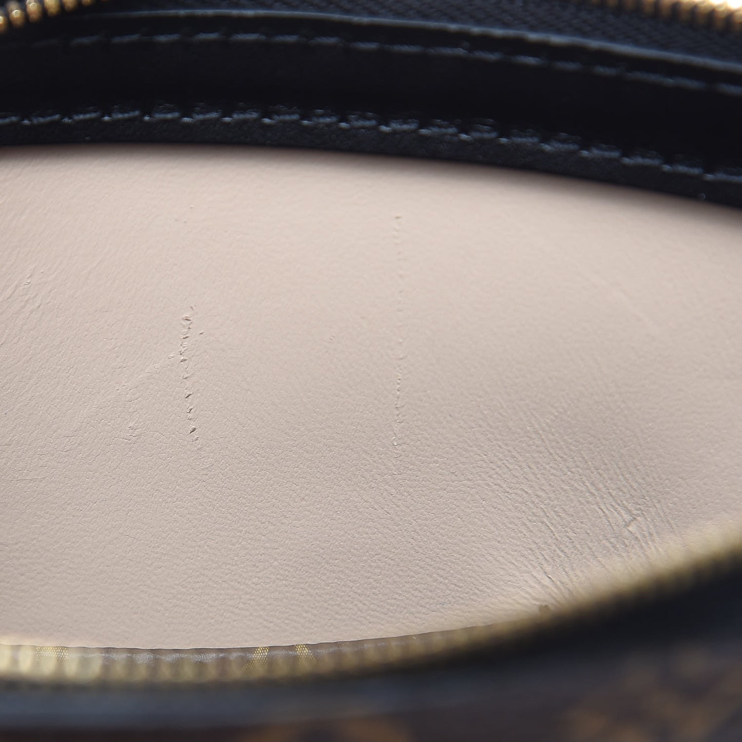 Reverse Monogram Trunk Clutch