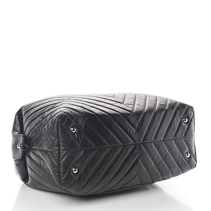 Chanel Aged Calfskin Chevron Quilted Duffle Bag Black 4 of 10
