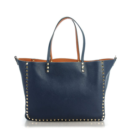 Valentino Garavani Pebbled Calfskin Medium Rockstud Reversible Tote Light Cuir Marine 1 of 7