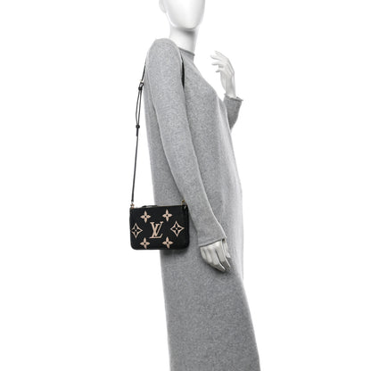 Louis Vuitton Empreinte Monogram Giant Double Zip Pochette Black Cream 2 of 11