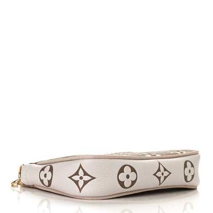 Louis Vuitton Empreinte Spring in the City Mini Pochette Accessories Kaki Beige Cream 3 of 8
