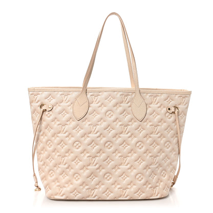 Louis Vuitton Empreinte Monogram Summer Stardust Neverfull MM Beige Clair 1 of 9