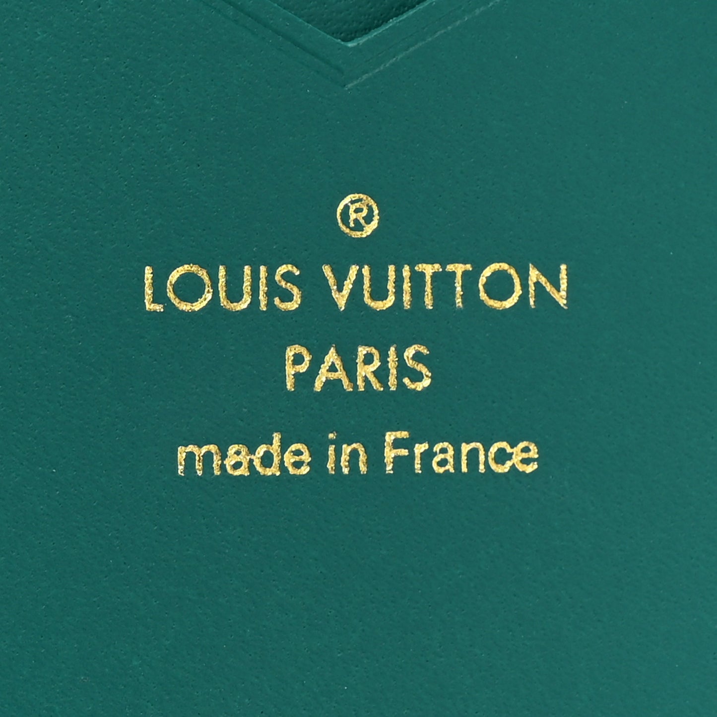 Taurillon Capucines Vertical Compact Wallet Green