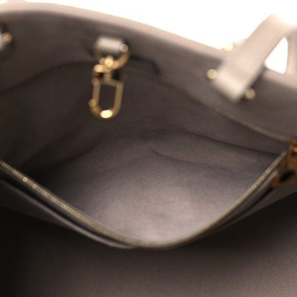 Louis Vuitton Empreinte Monogram Giant Onthego MM Tourterelle Creme 6 of 13