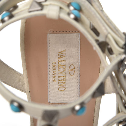 Valentino Garavani Pebbled Calfskin Turquoise Rockstud Rolling Ankle Strap 65mm Pumps 39 Ivory 7 of 9