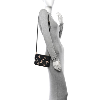 Louis Vuitton Empreinte Monogram Giant Double Zip Pochette Black Cream 2 of 11