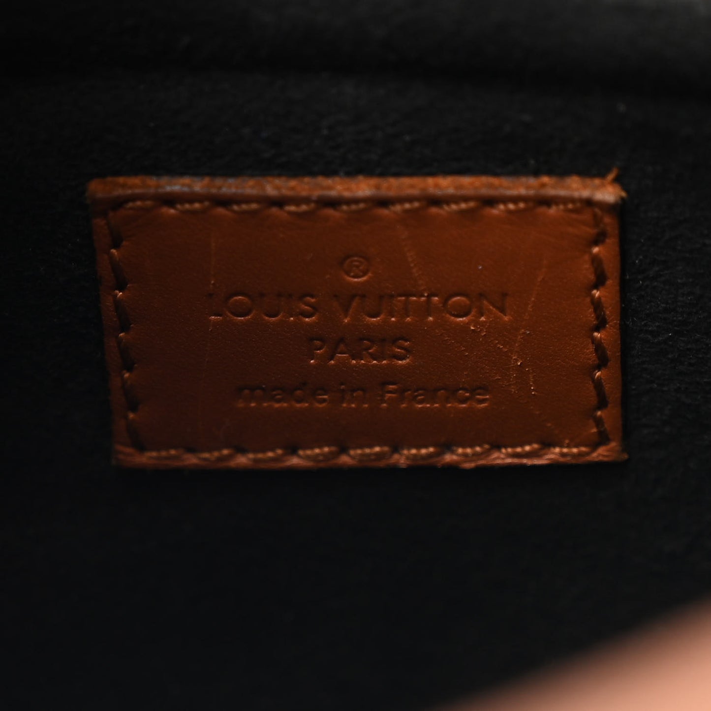 Reverse Monogram Dauphine Backpack PM