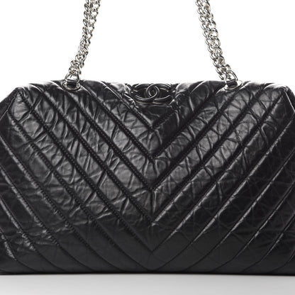 Chanel Aged Calfskin Chevron Quilted Duffle Bag Black 8 of 12