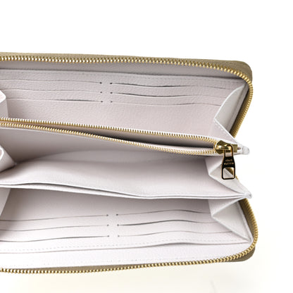 Louis Vuitton Empreinte Monogram Spring in the City Zippy Wallet Kaki Beige Cream 5 of 9