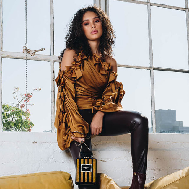 lifestyle image of model wearing chanel minaudiere bag FASHIONPHILE