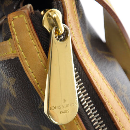 Louis Vuitton Monogram Tulum PM 7 of 10