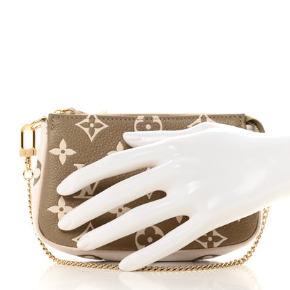 Louis Vuitton LOUIS VUITTON Empreinte Spring in the City Mini Pochette Accessories Kaki Beige Cream 2 of 6