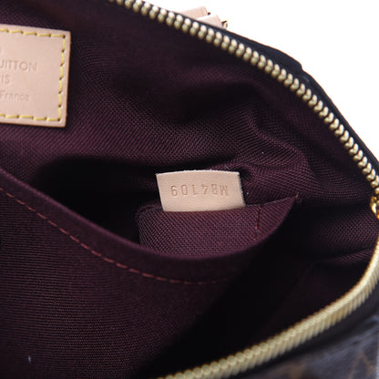 Louis Vuitton Monogram Rivoli PM 7 of 10
