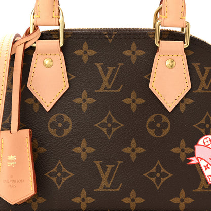 Louis Vuitton Monogram World Tour Alma BB 7 of 10