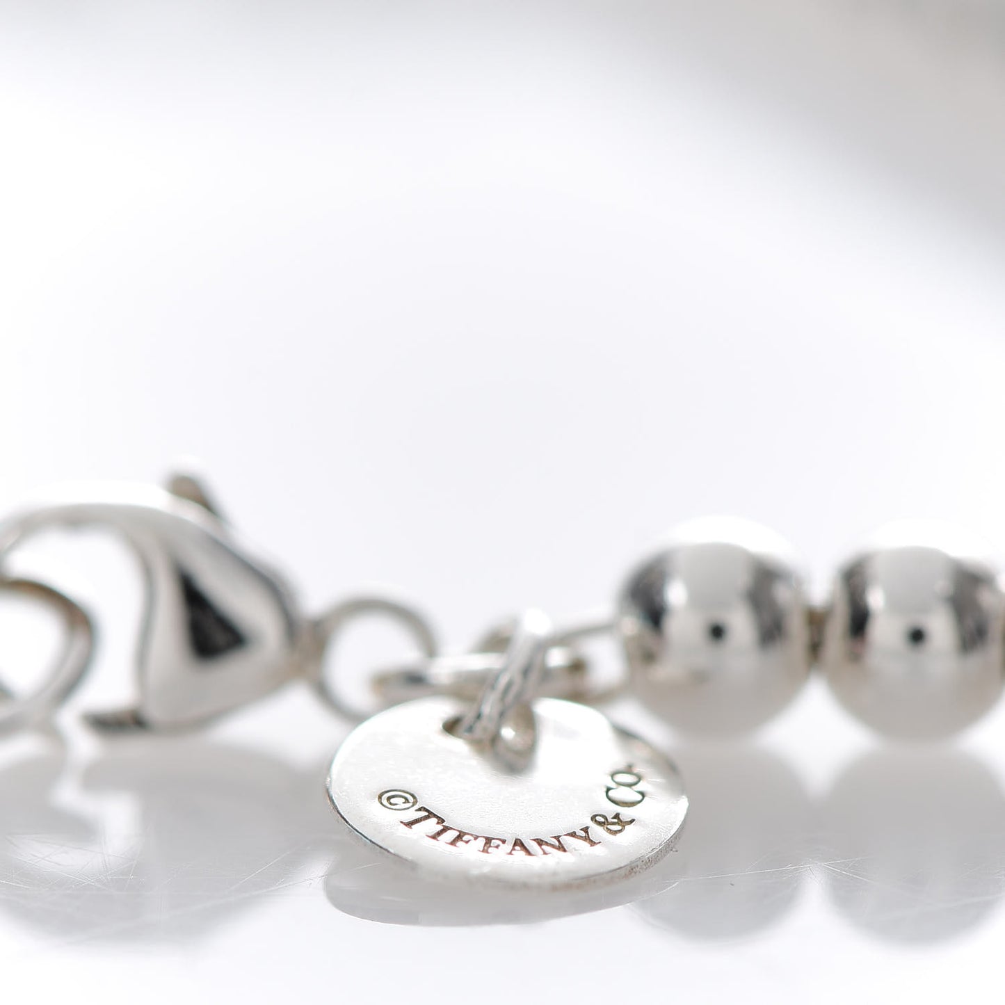 Sterling Silver 4mm Bow Bead Bracelet