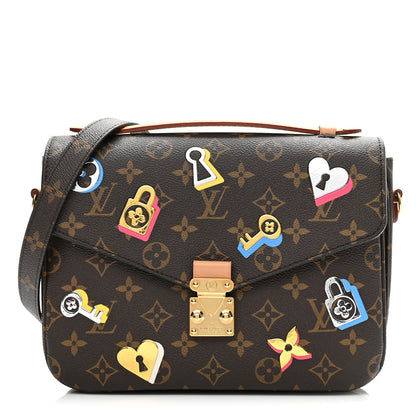 Louis Vuitton Monogram Love Lock Pochette Metis 1 of 7