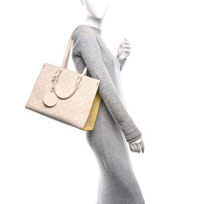 Louis Vuitton Empreinte Monogram Spring In The City Onthego MM Beige Pink Yellow 2 of 9