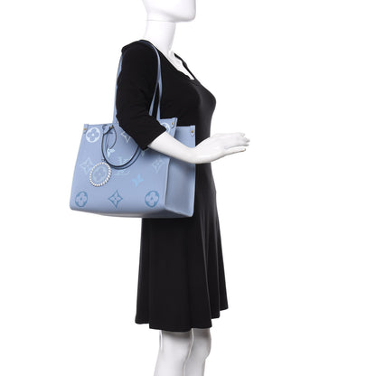 Louis Vuitton Empreinte Monogram Giant By The Pool Onthego MM Summer Blue 2 of 10