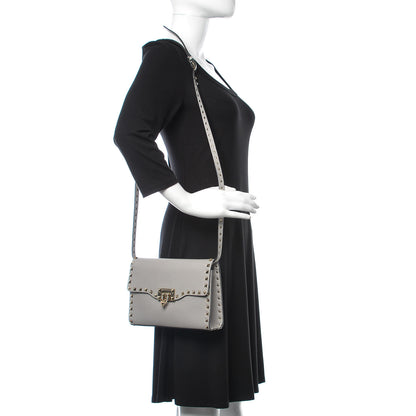 Valentino Garavani Pebbled Calfskin Medium Rockstud Flip Lock Crossbody Bag Pastel Grey 2 of 8