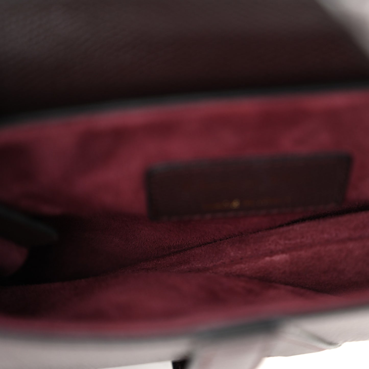 Grained Calfskin Mini Saddle Bag Plum