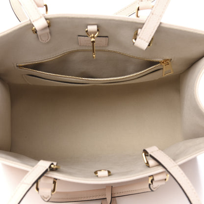 Louis Vuitton Empreinte Monogram Giant By The Pool Onthego MM Cream Saffron 5 of 10