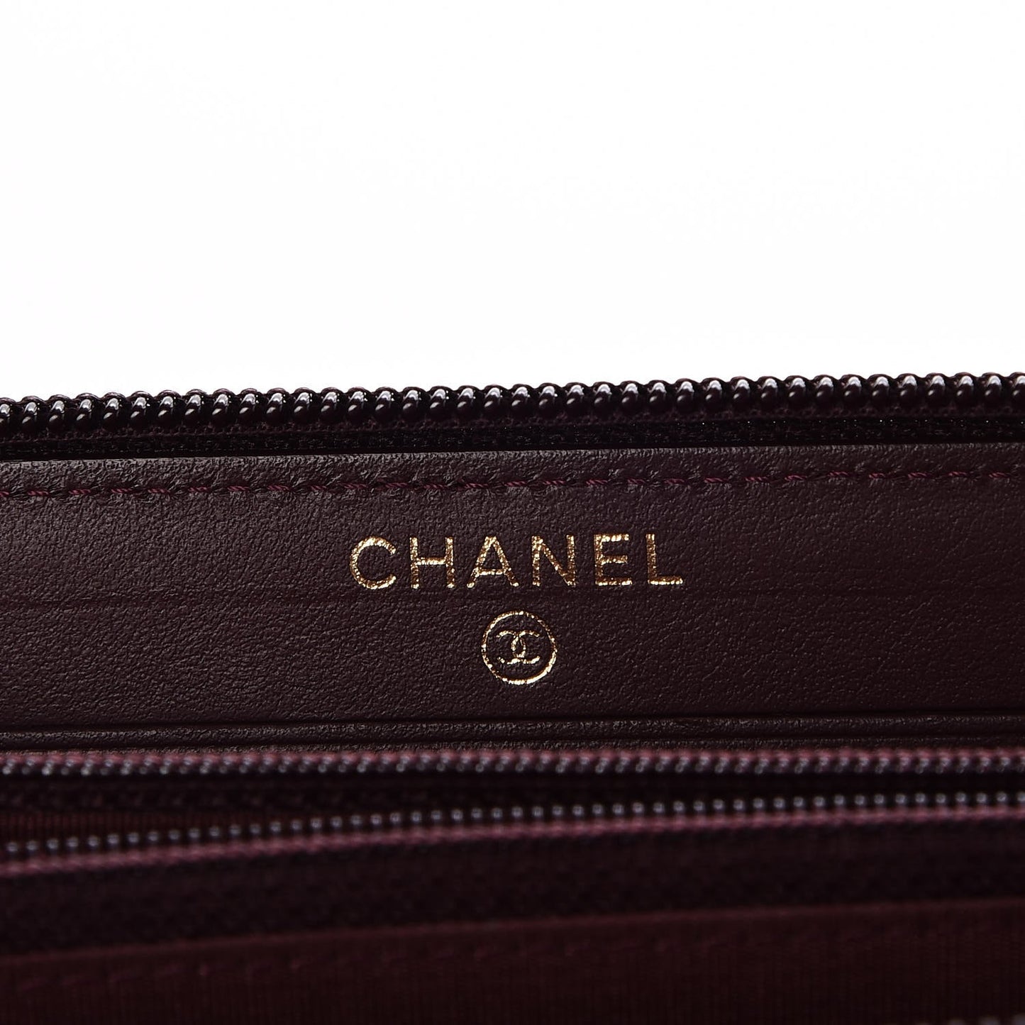 Caviar Quilted Small Boy Zip Around Wallet Dark Purple