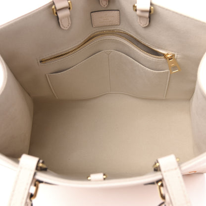 Louis Vuitton Empreinte Monogram Giant By The Pool Onthego MM Cream Saffron 6 of 11