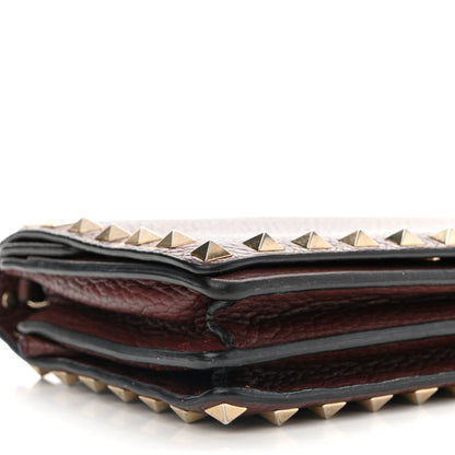 Valentino Garavani Pebbled Calfskin Rockstud Wallet on Chain Rubin 8 of 12