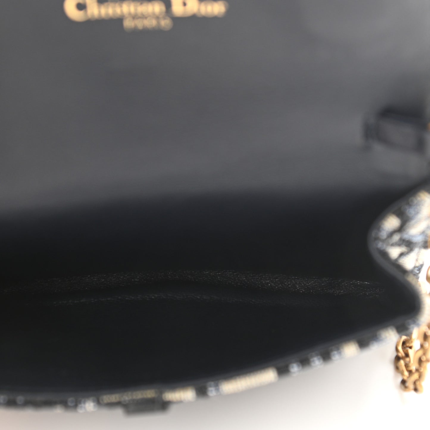 Oblique Nano Saddle Chain Pouch Blue