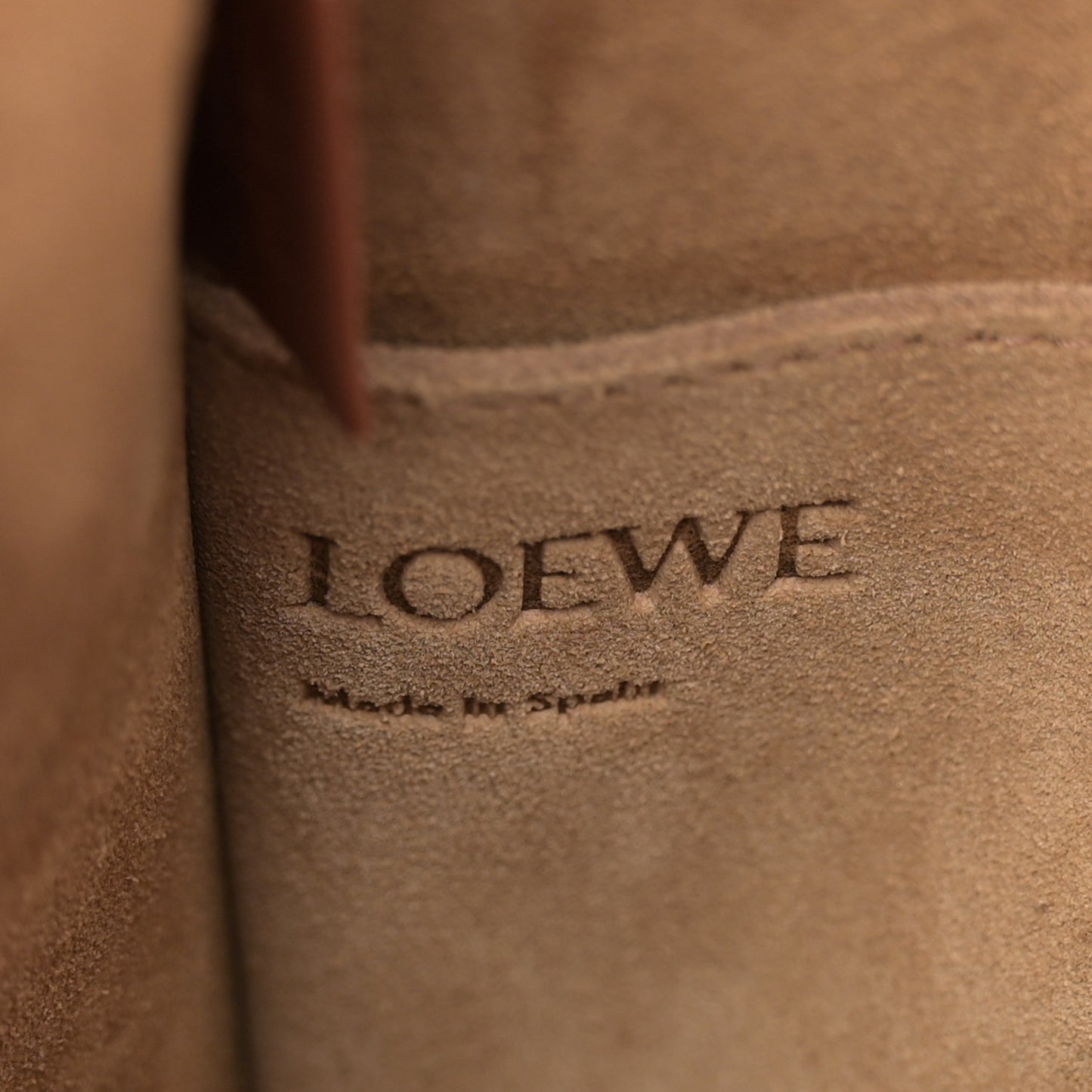 Calfskin Perforated Anagram Gate Bucket Bag Black Tan