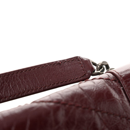 Saint Laurent Crinkled Calfskin Matelasse Monogram Medium Niki Chain Satchel Rouge Legion 13 of 13