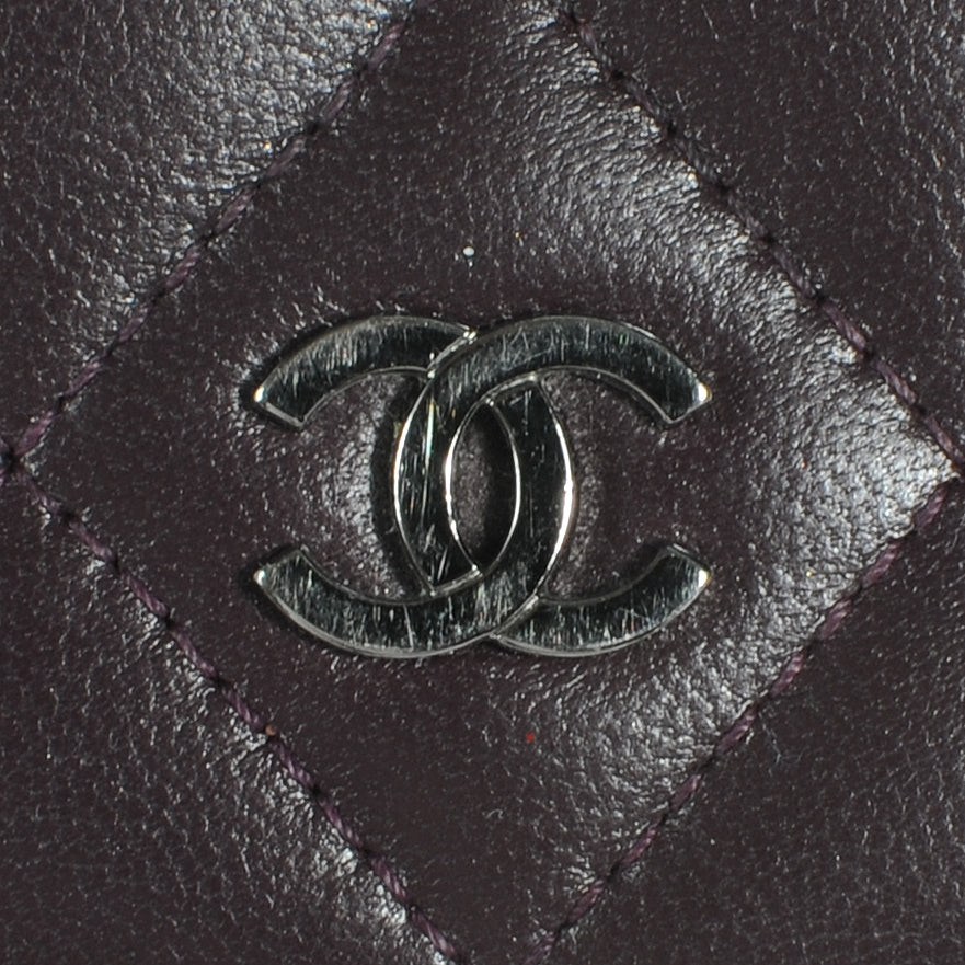 Lambskin Quilted Yen Wallet Plum