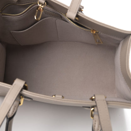 Louis Vuitton Empreinte Monogram Giant Onthego MM Tourterelle 5 of 13
