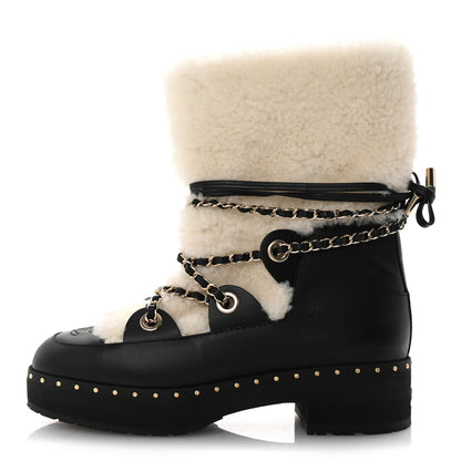 Chanel Calfskin Shearling Lambskin CC Cap Toe Chain Snow Boots 39 Black White 1 of 10