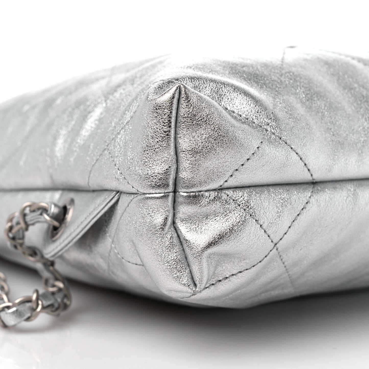Metallic Calfskin Quilted Chanel 22 Backpack Silver