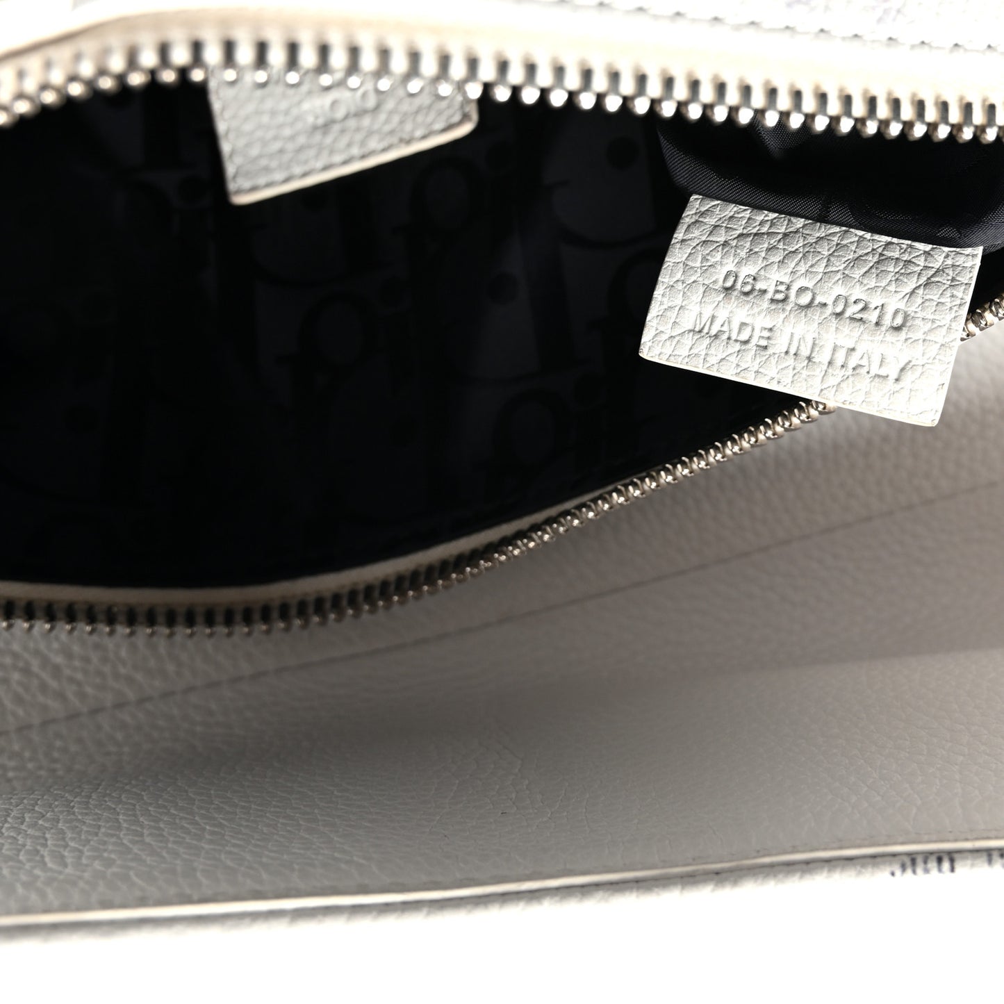 X Daniel Arsham Grained Calfskin Newspaper Print Saddle Bag White